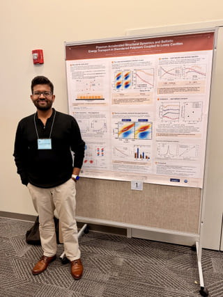 Saptarsi Mondal standing beside his poster on plasmon-accelerated structural dynamics at the Vibrational Spectroscopy Gordon Research Conference.